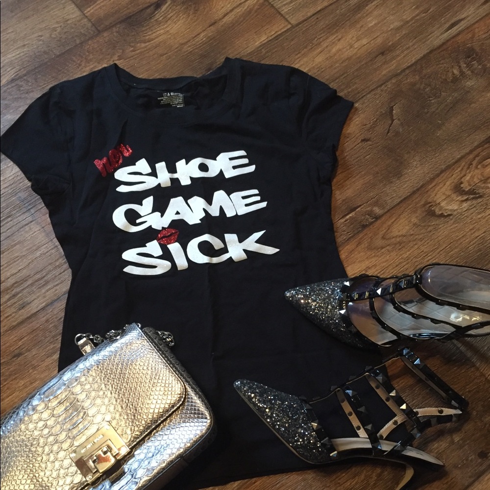 Shoe ❤️’s All 👀 on this tee. Her Shoe game SICK.